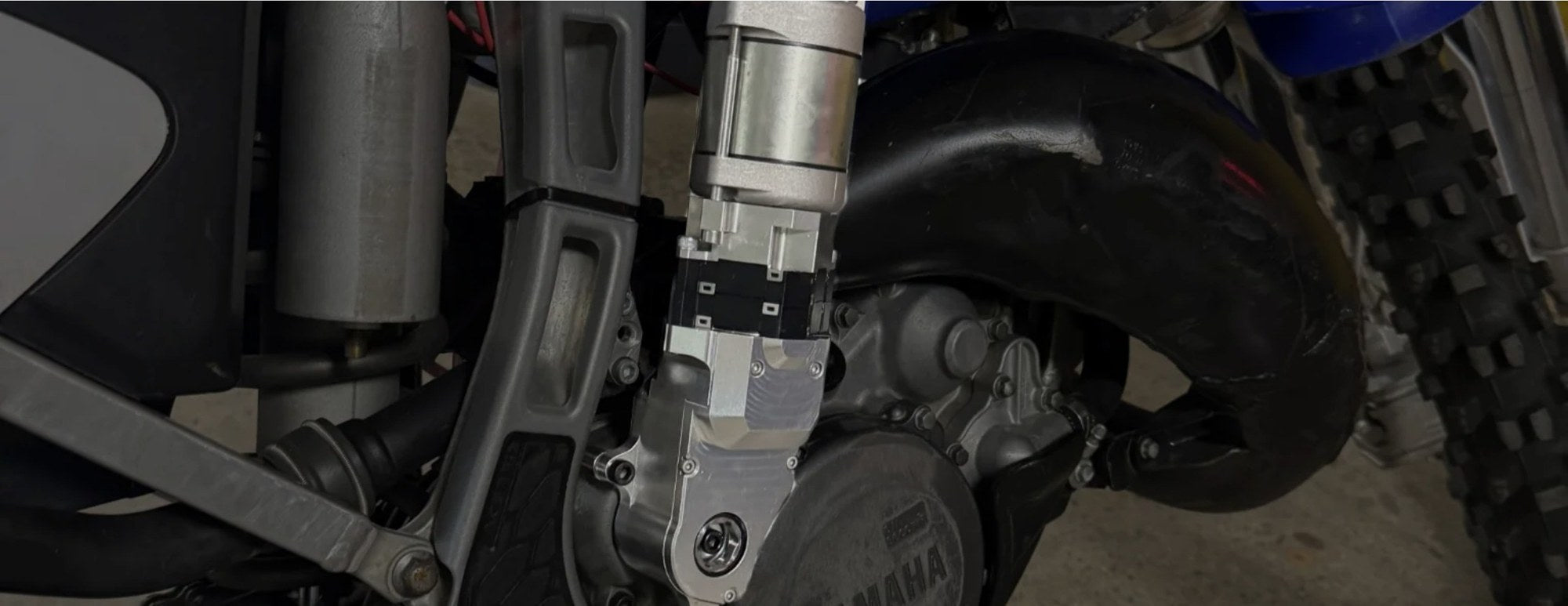 ES125 starter unit mounted to a Yamaha YZ125 engine case