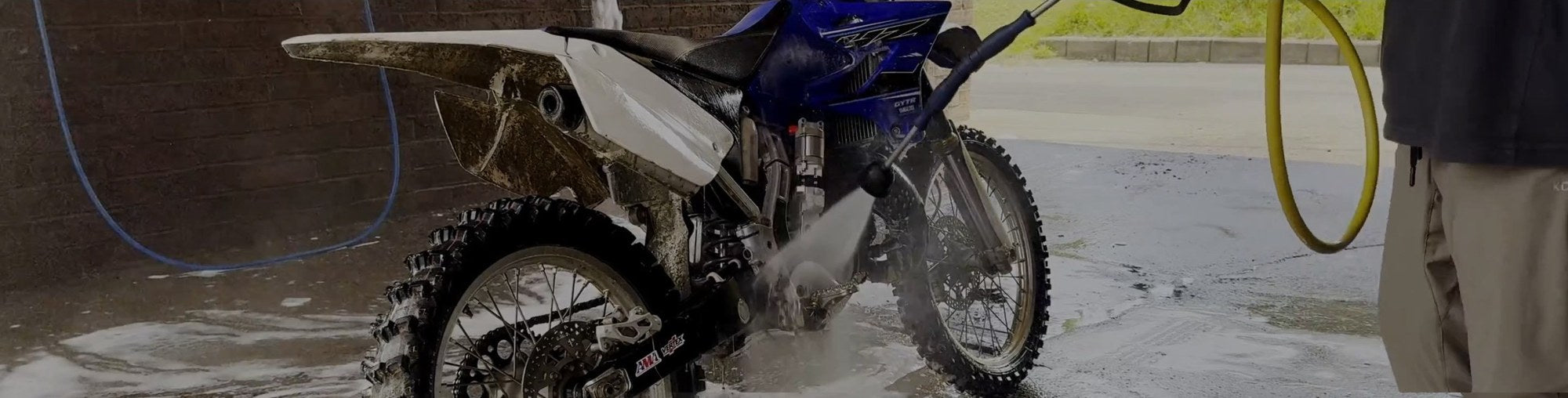 YZ125 being washed down after a ride